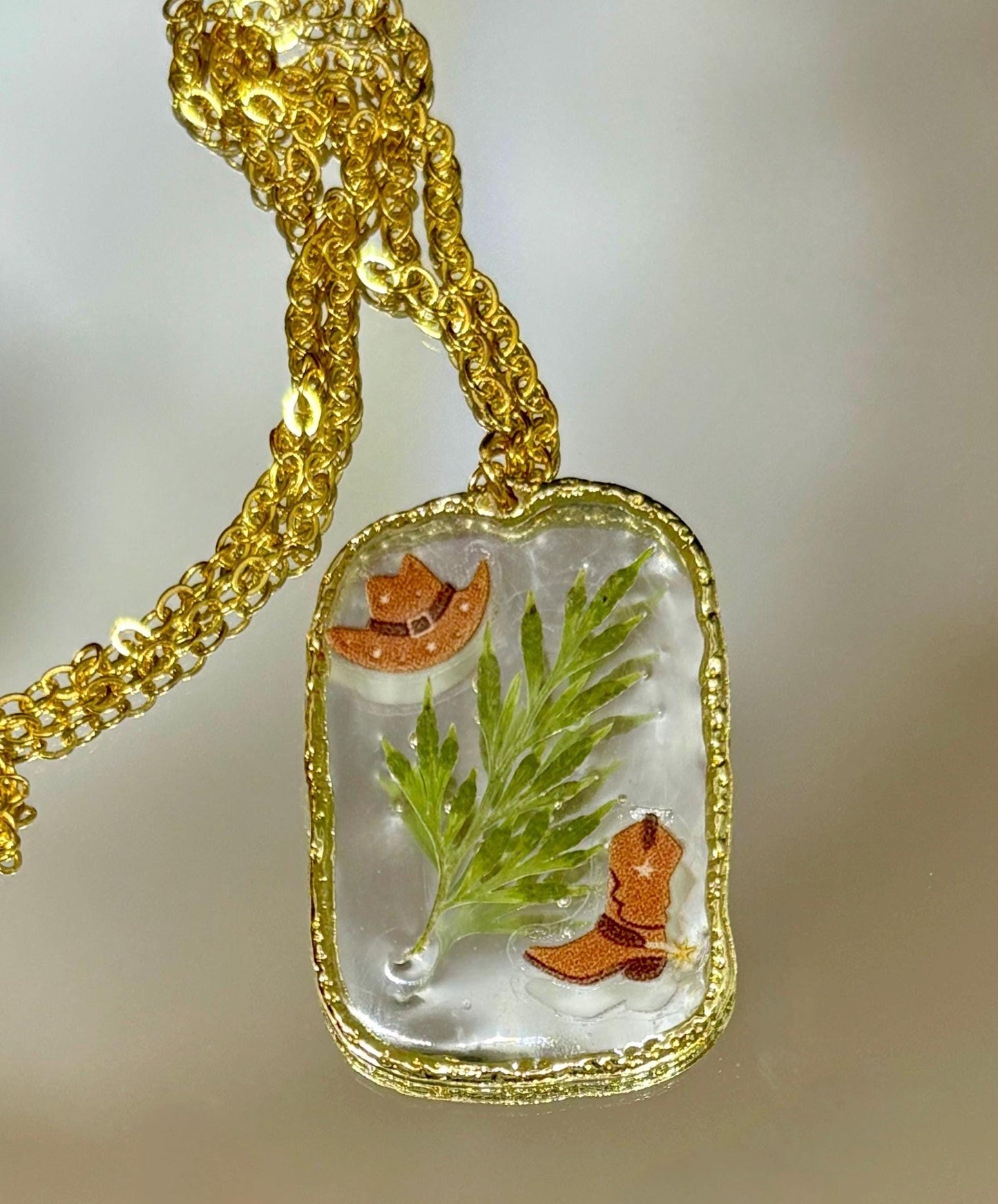 Resin Western Pendant Necklace: Cowboy Hat, Boot and Green Leaf - Gold Cowgirl Jewelry Necklaces Consecrated Jewelry Co.