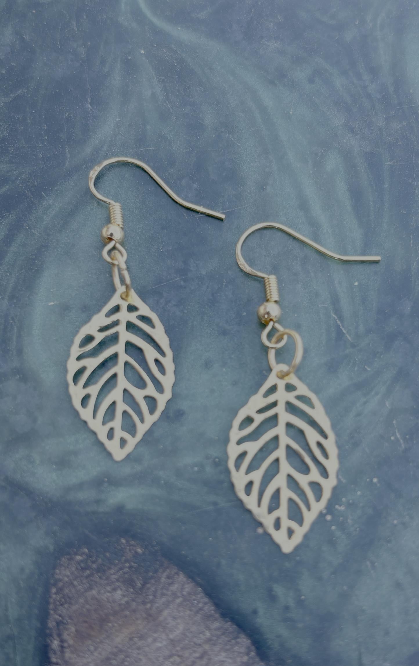 Gold Leaf Dangle Earrings | Metal Cutout Golden Leaves Boho Earrings Consecrated Jewelry Co.