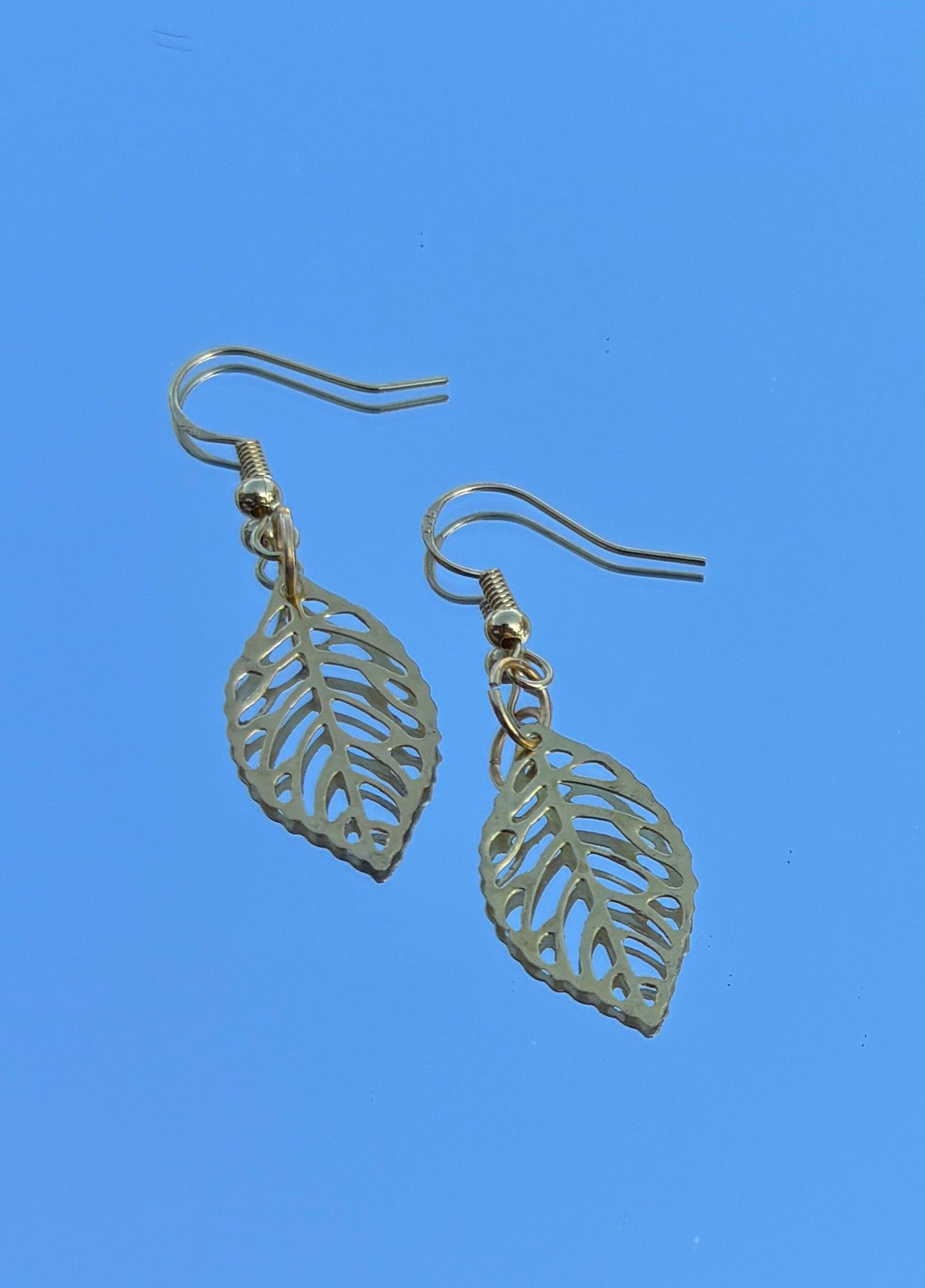 Gold Leaf Dangle Earrings | Metal Cutout Golden Leaves Boho Earrings Consecrated Jewelry Co.