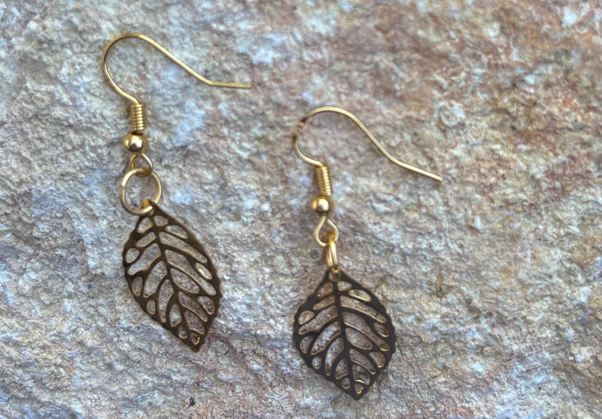 Gold Leaf Dangle Earrings | Metal Cutout Golden Leaves Boho Earrings Consecrated Jewelry Co.