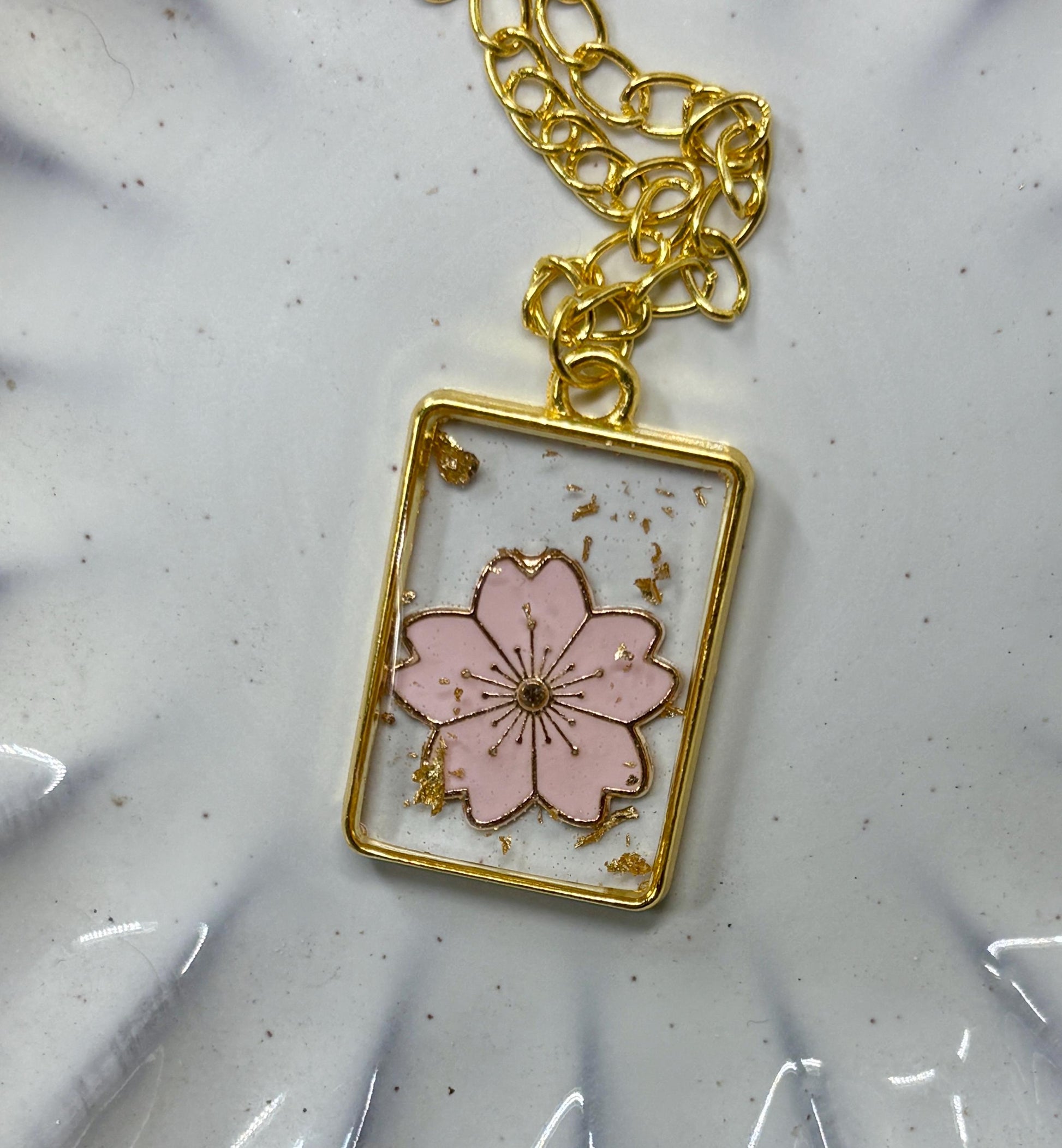 Pink Flower Resin Necklace | Gold Flake Pendant Necklaces Consecrated Jewelry Co.